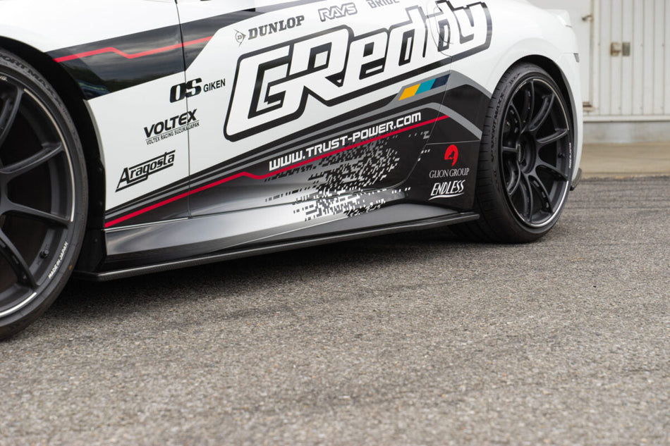 Faldones laterales GReddy para Nissan Z RZ34 (400Z) - en fibra