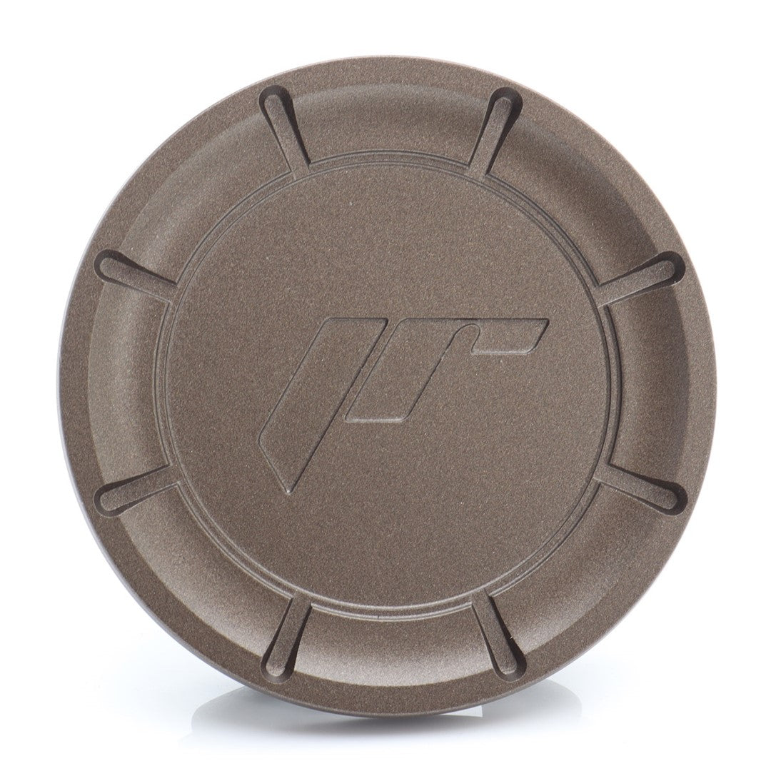 Tapacubos central Japan Racing para JR-38 en bronce
